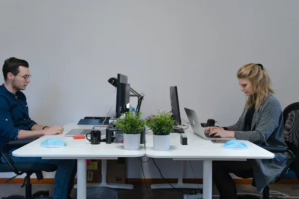 Person reviewing work on laptop